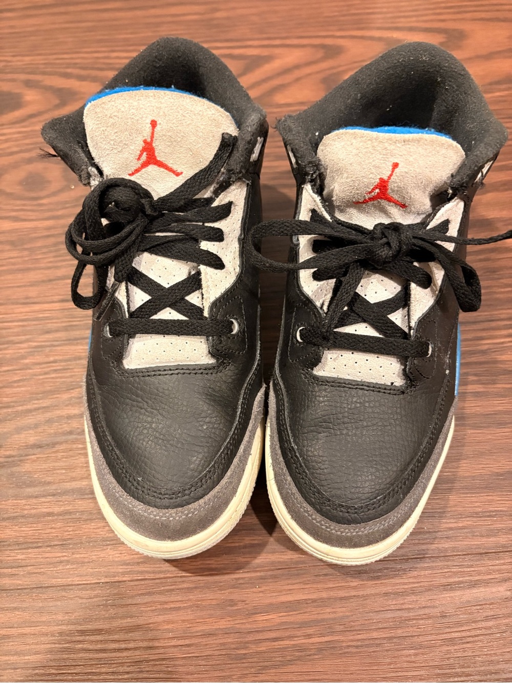 Jordan Kids Black/Gray Sneakers with Red Logo and Blue Trim